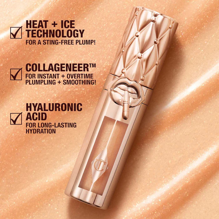 Charlotte Tilbury
Big Lip Plumpgasm Plumping Lip Gloss Color: Nudegasm Diamonds - Sheer, champagne-nude
