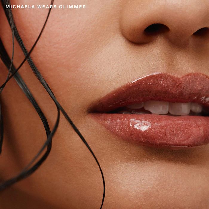Rare Beauty by Selena Gomez
Positive Light Luminizing Lip Gloss Color: Glimmer - rose gold with champagne and rose gold pearl