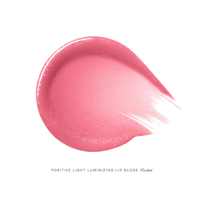 Rare Beauty by Selena Gomez
Positive Light Luminizing Lip Gloss Color: Flicker - pink with pink and blue pearl