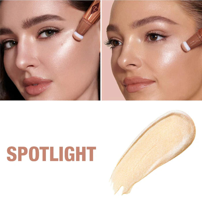 Charlotte Tilbury
Beauty Highlighter Wand Color: Spotlight - rose gold with silver light