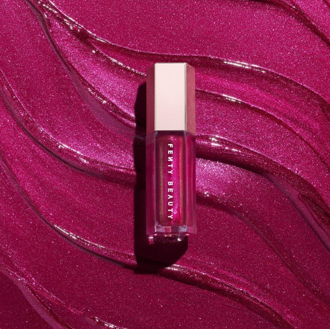 Fenty Beauty by Rihanna
Gloss Bomb Universal Lip Luminizer Color: Fuchsia Flex - shimmering holographic deep fuchsia