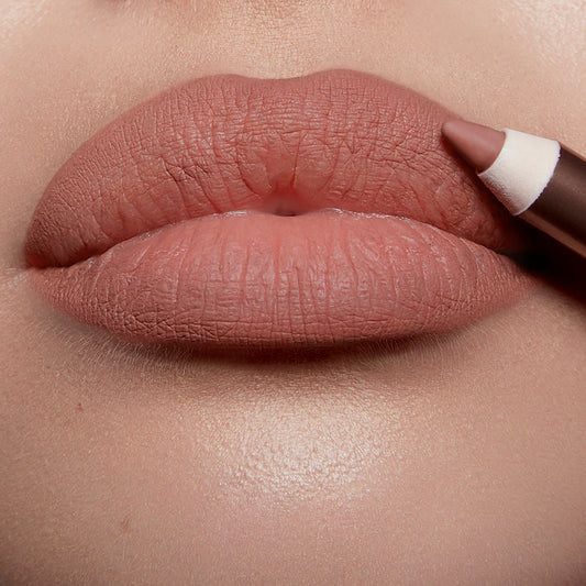 Charlotte Tilbury
Lip Cheat Lip Liner Color: Pillow Talk - pink nude