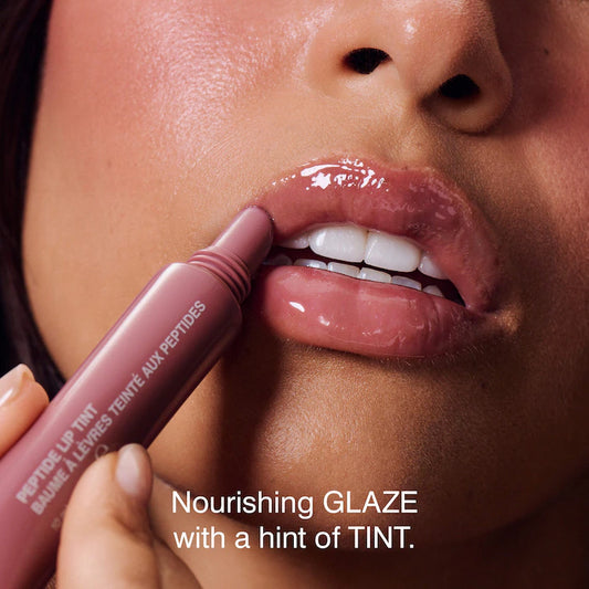 rhode
Peptide Lip Tint Nourishing Glaze Color: Salty Tan - soft mauve