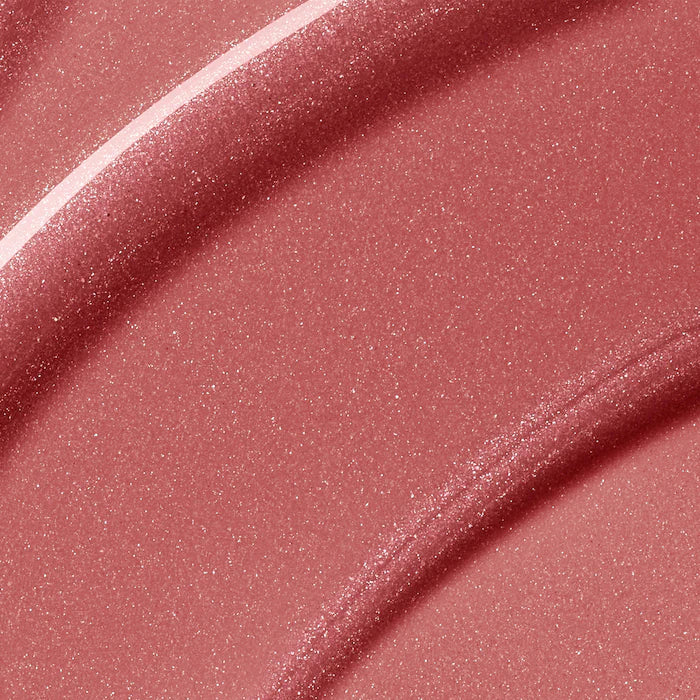 Rare Beauty by Selena Gomez
Positive Light Luminizing Lip Gloss Color: Glimmer - rose gold with champagne and rose gold pearl