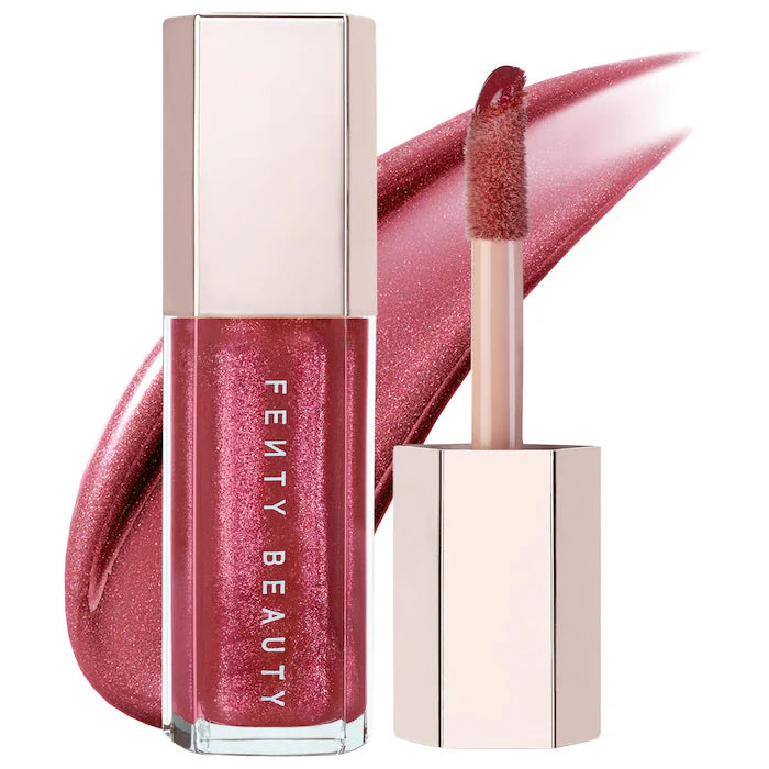 Fenty Beauty by Rihanna
Gloss Bomb Universal Lip Luminizer Color: Riri - shimmering rose mauve nude