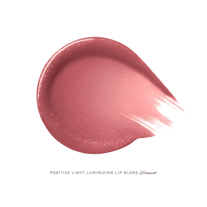 Rare Beauty by Selena Gomez
Positive Light Luminizing Lip Gloss Color: Glimmer - rose gold with champagne and rose gold pearl