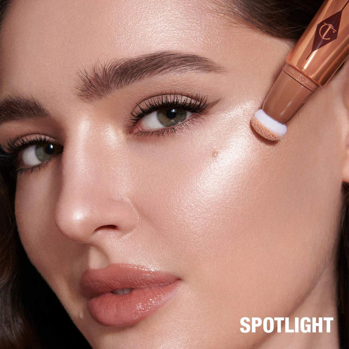Charlotte Tilbury
Beauty Highlighter Wand Color: Spotlight - rose gold with silver light