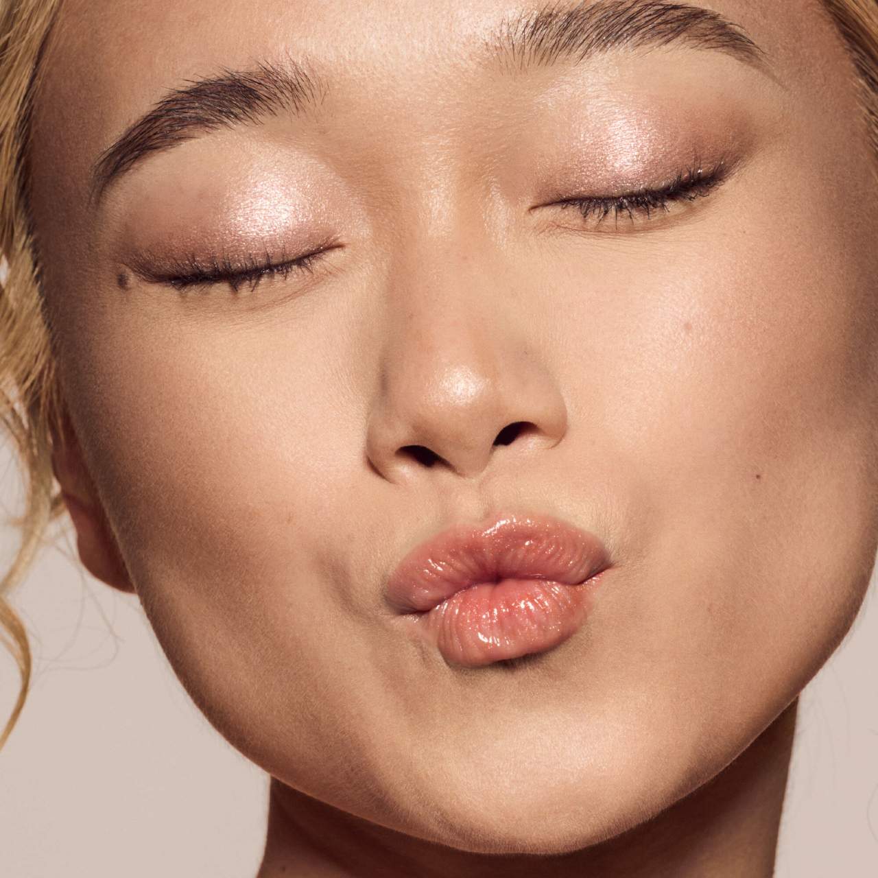 Fenty Beauty by Rihanna
Gloss Bomb Universal Lip Luminizer Color: Fenty Glow - shimmering rose nude