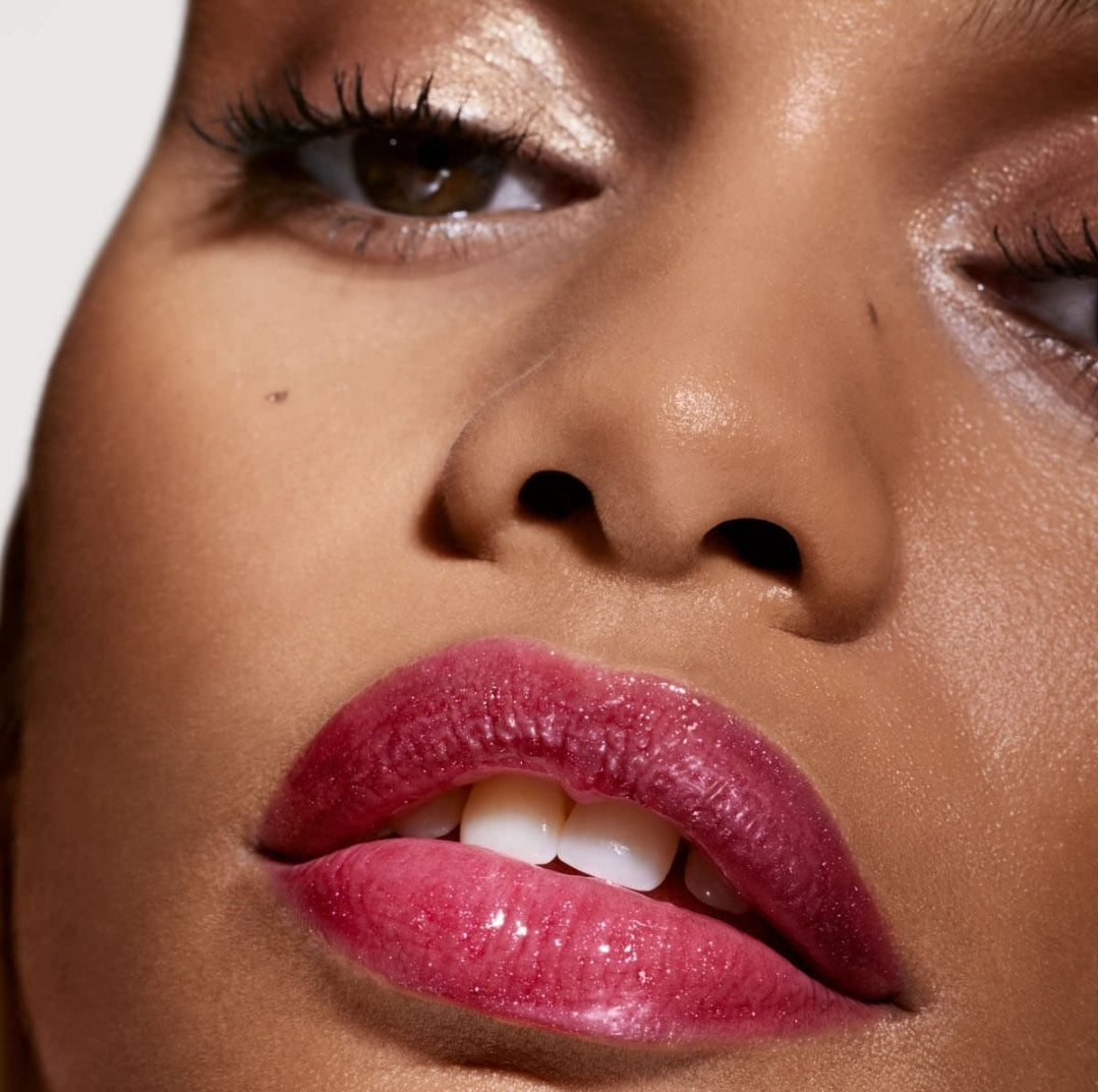 Fenty Beauty by Rihanna
Gloss Bomb Universal Lip Luminizer Color: Fuchsia Flex - shimmering holographic deep fuchsia