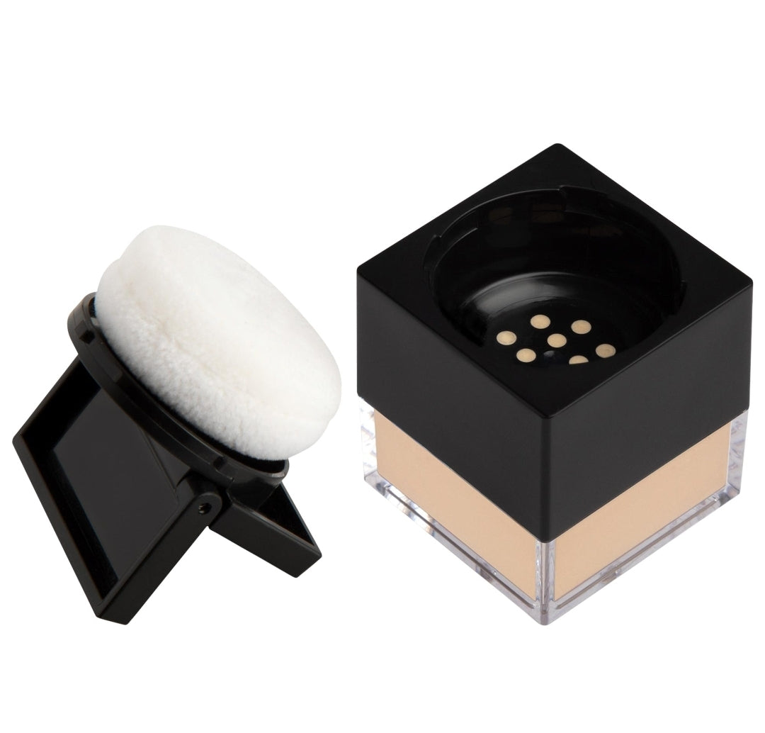 HUDA BEAUTY
Mini Easy Bake Loose Baking & Setting Powder Color: Banana Bread - light, medium, and tan skin tones. golden undertones brighten and disguise under-eye darkness.
