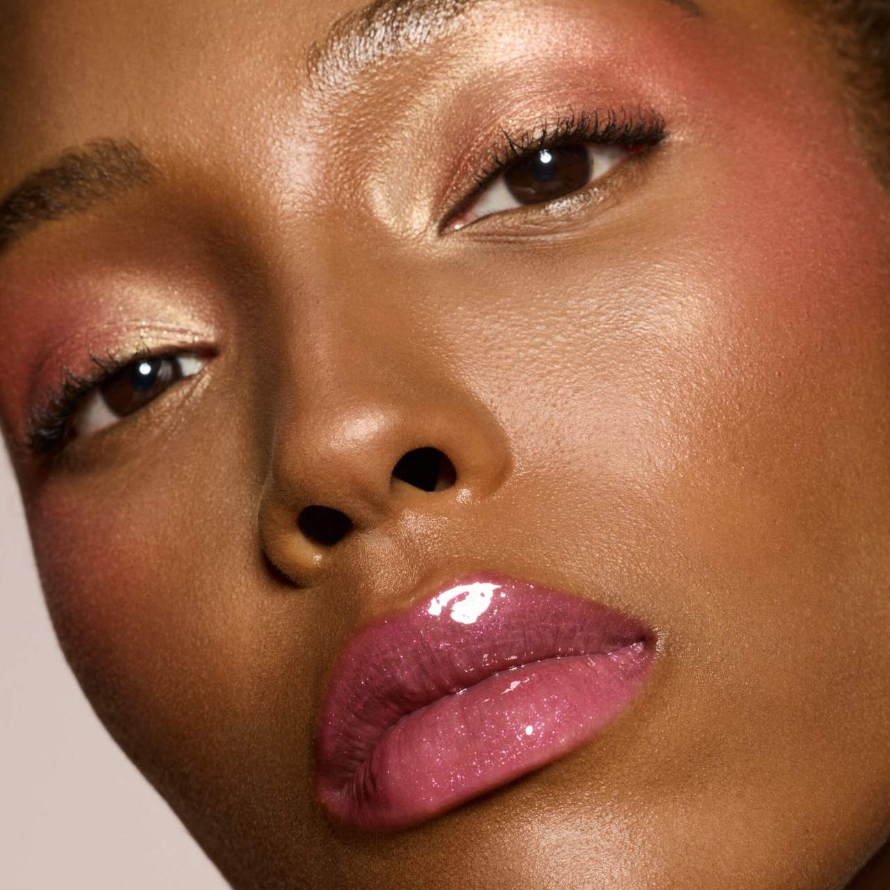 Fenty Beauty by Rihanna
Gloss Bomb Universal Lip Luminizer Color: Riri - shimmering rose mauve nude