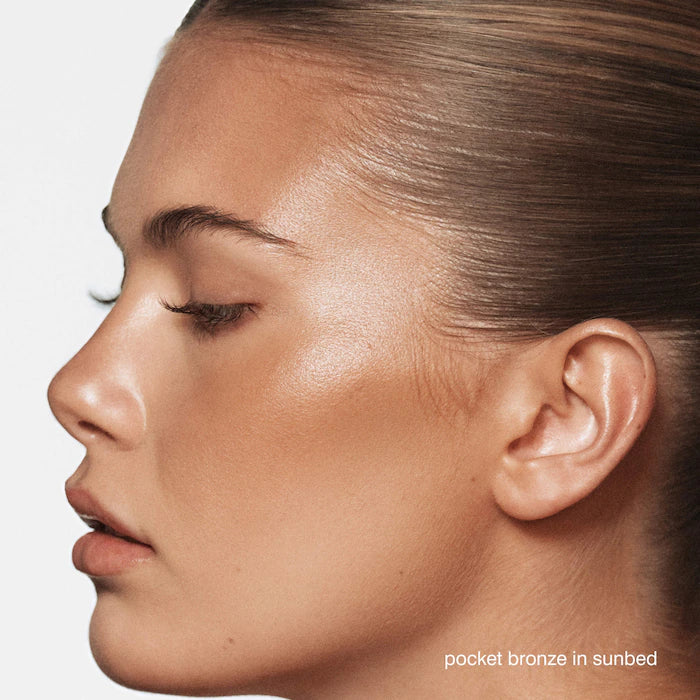 rhode
Pocket Bronze Long-Wearing Color: sunbed - light-medium to medium with a neutral