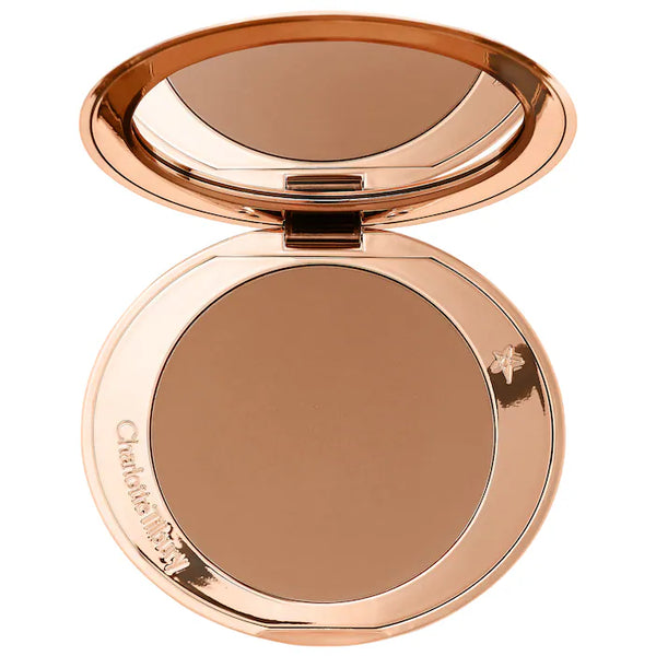 Charlotte Tilbury 
Refillable Airbrush Matte Bronzer Color: Medium - medium golden bronze