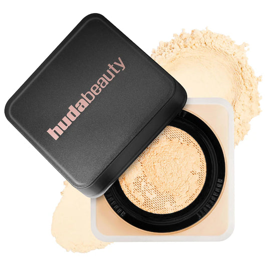 HUDA BEAUTY 
Easy Bake Blurring Loose Baking & Setting Powder Color: Banana Bread - light, medium, and tan skin tones. golden undertones brighten and disguise under-eye darkness.