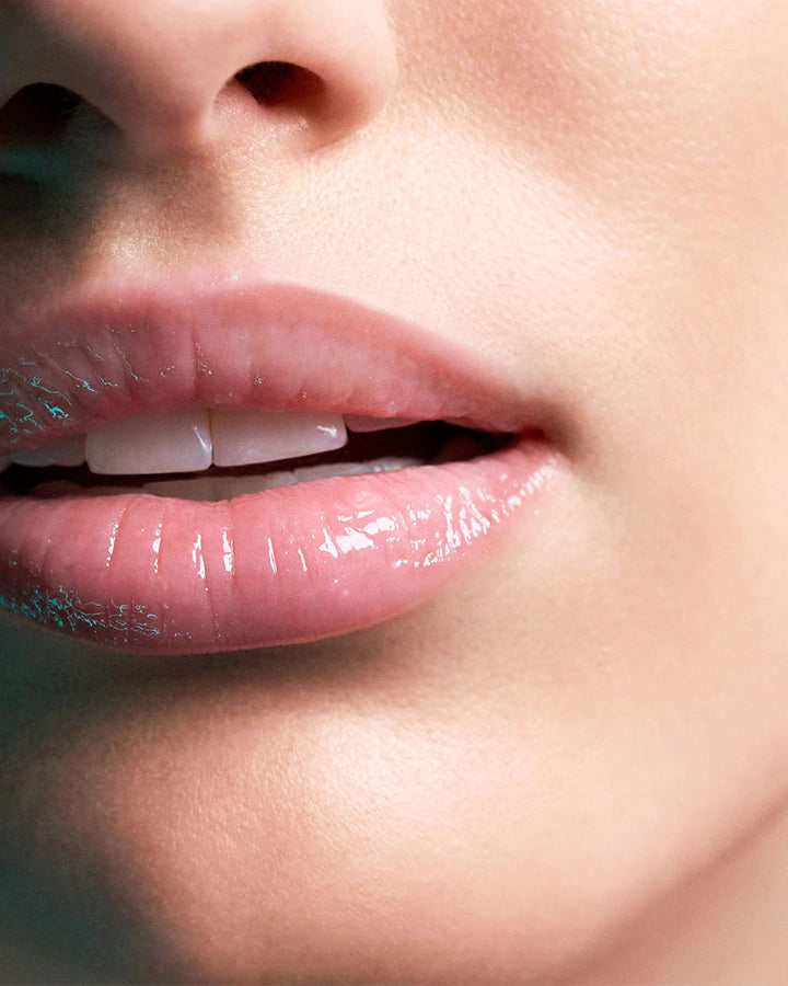 La Mer 
The Lip Volumizer Color: Sheer Shine - Ultra- sheer soft pink with delicate shimmer