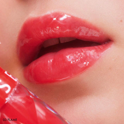 SEPHORA COLLECTION 
Outrageous Plump Intense Hydrating Lip Gloss Color: 03 Flame - shimmer free cherry red