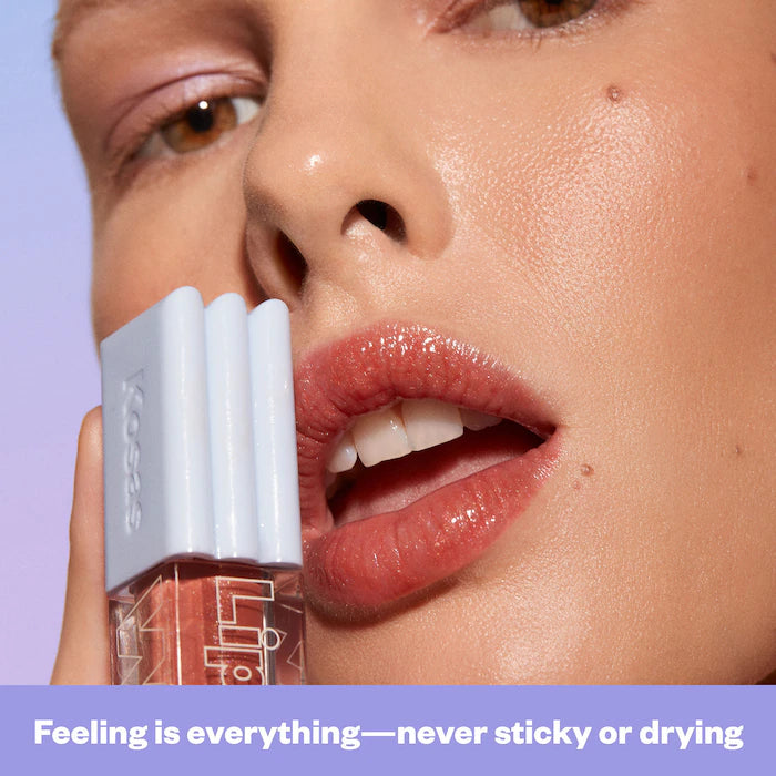 Kosas 
Wet Lip Oil Plumping Peptide Lip Treatment Gloss Color: Dip - neutral pearly nude