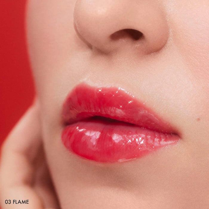 SEPHORA COLLECTION 
Outrageous Plump Intense Hydrating Lip Gloss Color: 03 Flame - shimmer free cherry red