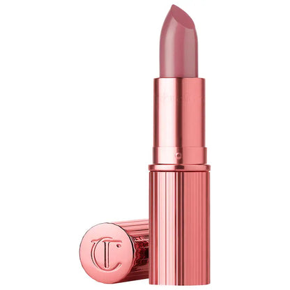 Charlotte Tilbury 
K.I.S.S.I.N.G Satin Shine Lipstick Color: Icon Baby - a warm nude baby pink for iconic lips in just one swipe