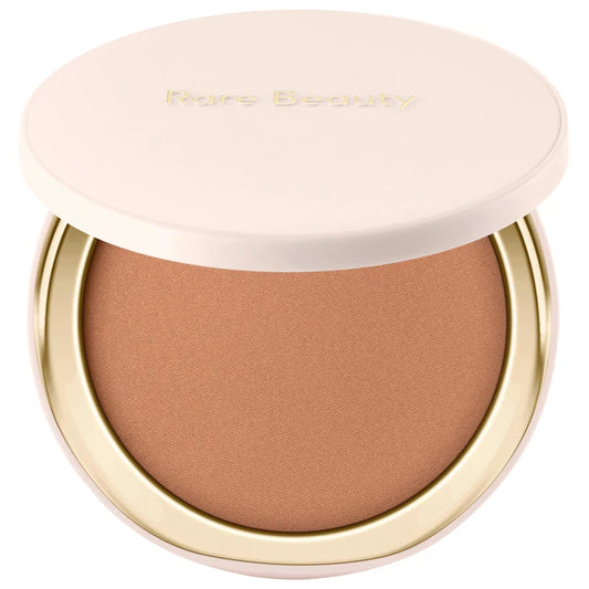 Rare Beauty by Selena Gomez 
Warm Wishes Soft Matte Powder Bronzer Color: Warmed Up - light brown with neutral warm undertone