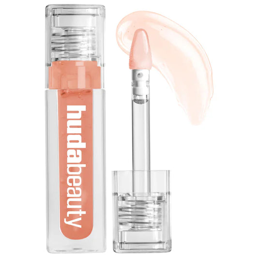 HUDA BEAUTY 
Faux Filler Ultra-Hydrating Tinted Jelly Lip Oil Color: Juicy Peach - sheer peachy nude