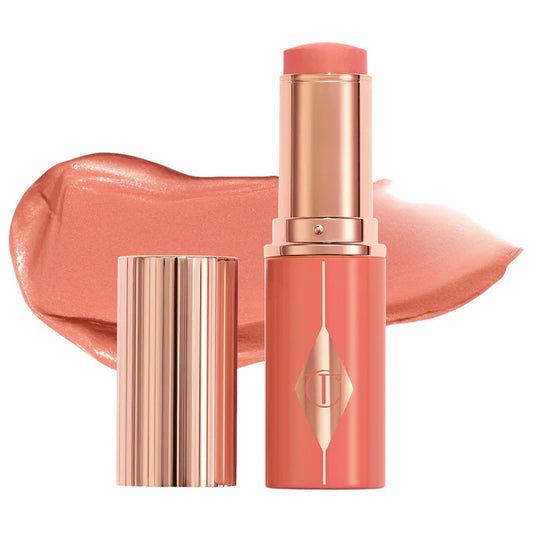 Charlotte Tilbury 
Unreal Lip + Cheek Glow Blush Stick with Hyaluronic Acid Color: Peach Glow - poppy peach