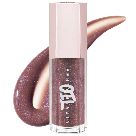 Fenty Beauty by Rihanna 
Gloss Bomb Oil Luminizing Lip Oil 'N Gloss Color: Rose Amber - sparkling cool taupe brown