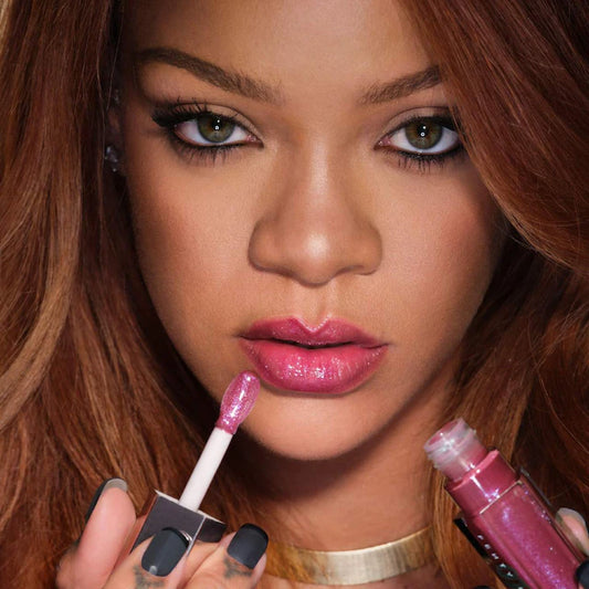 Fenty Beauty by Rihanna 
Gloss Bomb Oil Luminizing Lip Oil 'N Gloss Color: Razzberry Jamz - sparkling bright berry