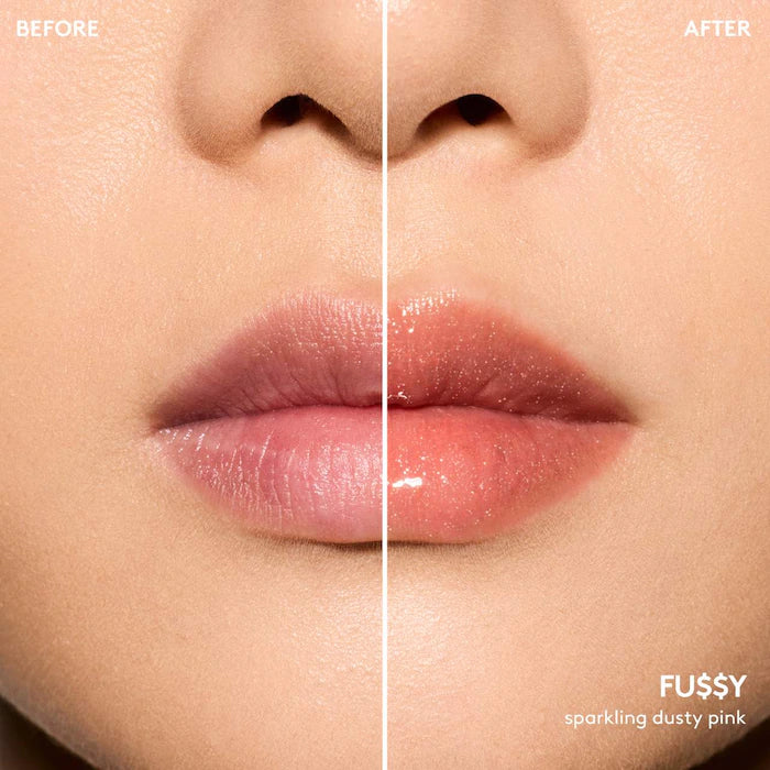 Fenty Beauty by Rihanna 
Gloss Bomb Oil Luminizing Lip Oil 'N Gloss Color: Fu$$Y - sparkling dusty pink