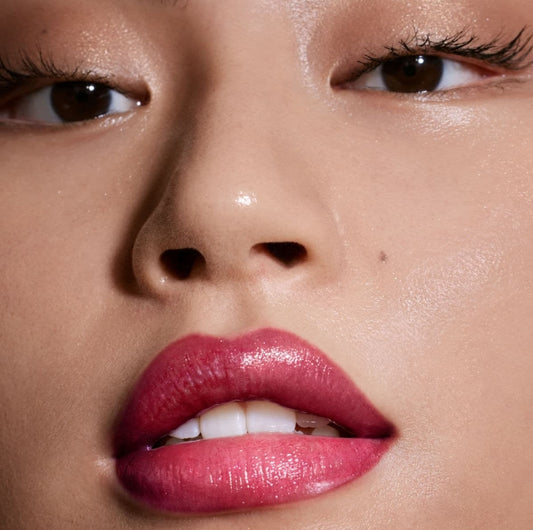 Fenty Beauty by Rihanna 
Gloss Bomb Universal Lip Luminizer Color: Fuchsia Flex - shimmering holographic deep fuchsia