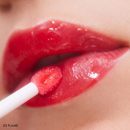SEPHORA COLLECTION 
Outrageous Plump Intense Hydrating Lip Gloss Color: 03 Flame - shimmer free cherry red