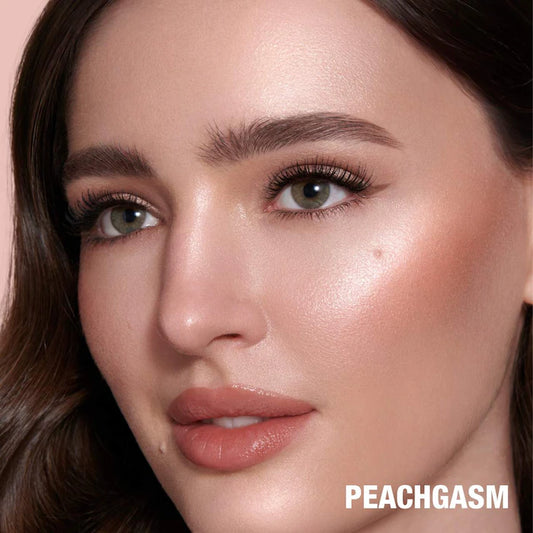 Charlotte Tilbury 
Beauty Highlighter Wand Color: Peachgasm - peach highlight