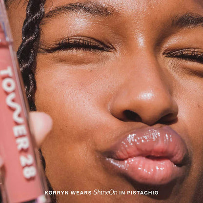 Tower 28 Beauty 
ShineOn Lip Jelly Hydrating Non-Sticky Lip Oil Color: Pistachio - semi-sheer, milky nude pink
