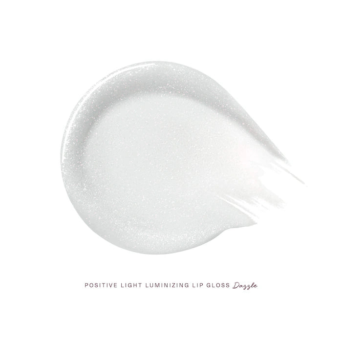 Rare Beauty by Selena Gomez 
Positive Light Luminizing Lip Gloss Color: Dazzle - sheer blue with multicolored shimmer