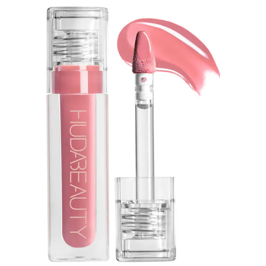 HUDA BEAUTY 
Faux Filler Shiny Non-Sticky Lip Gloss Color: Sugar Baby - light pink