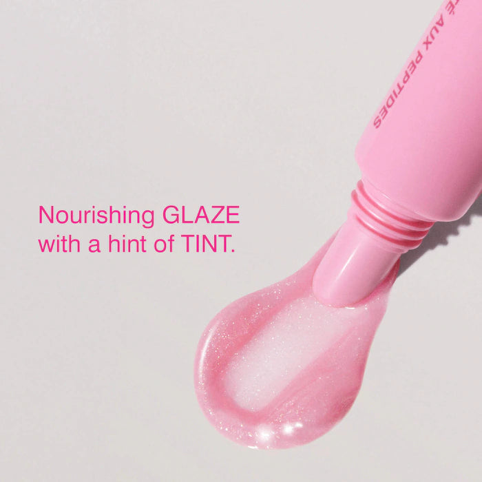 rhode 
Peptide Lip Tint Nourishing Glaze Color: Jelly Bean - shimmery sheer baby pink