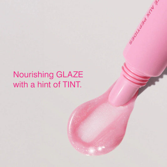 rhode 
Peptide Lip Tint Nourishing Glaze Color: Jelly Bean - shimmery sheer baby pink