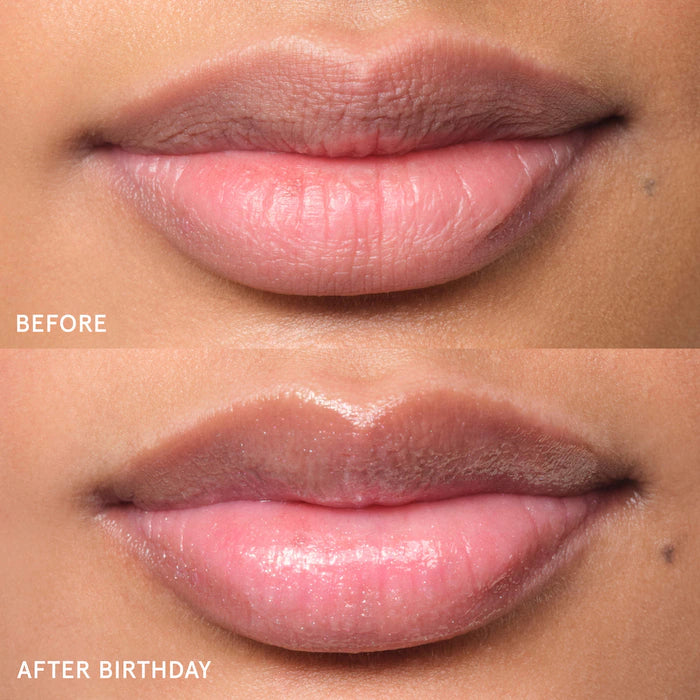 Glossier 
Balm Dotcom Lip Balm and Skin Salve Color: Birthday - soft shimmer clear